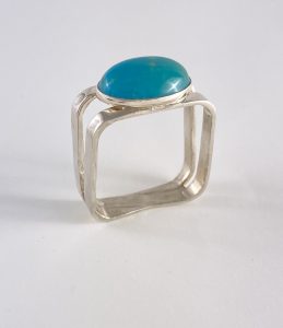 square shaped silver with turquoise stone ring view 1