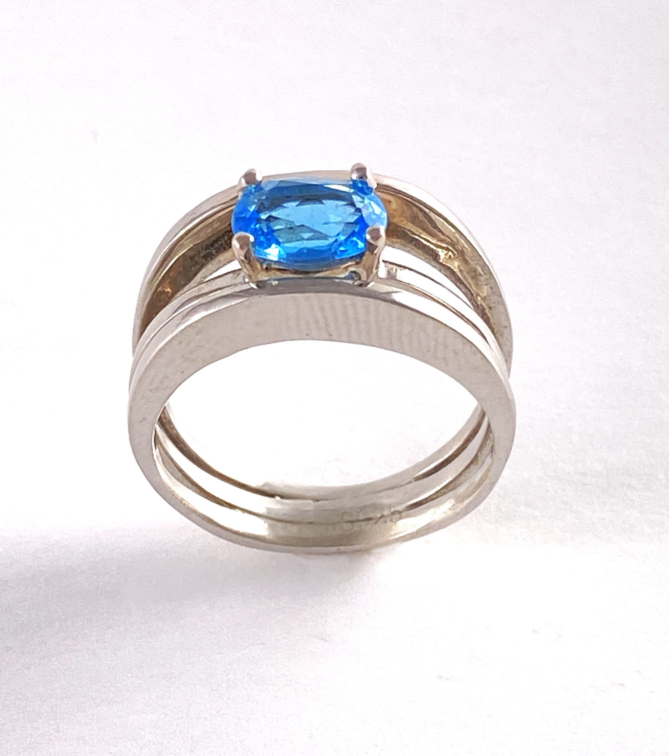ring with Blue Topaz stone and 3 band design view 2