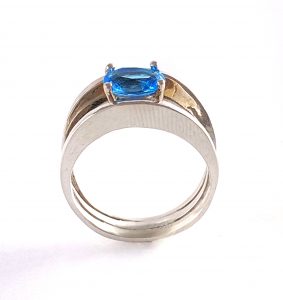 ring with Blue Topaz stone and 3 band design view 1