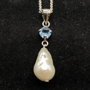 potato pearl with blue topaz pendant