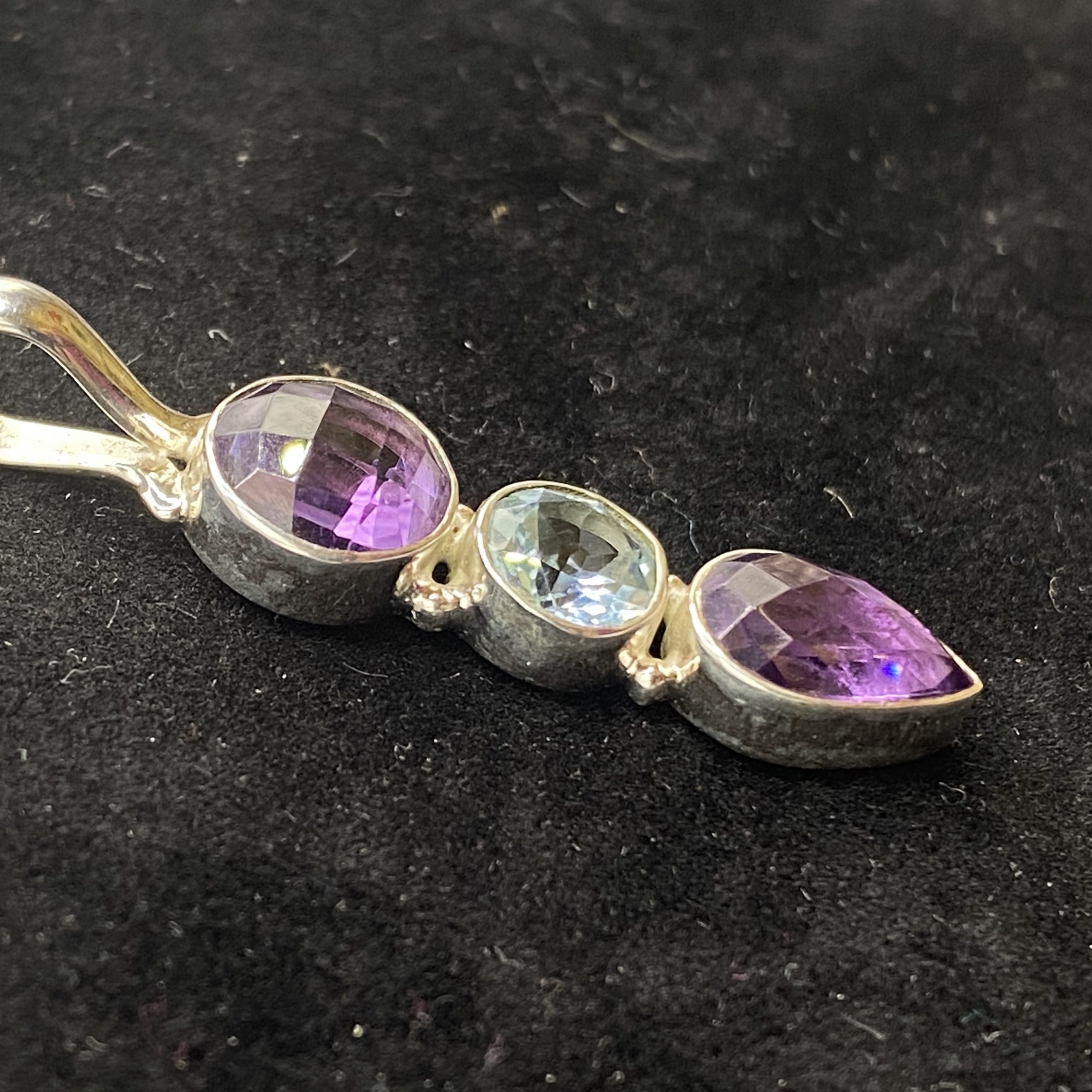 Round faceted Amethyst and blue topaz pendant