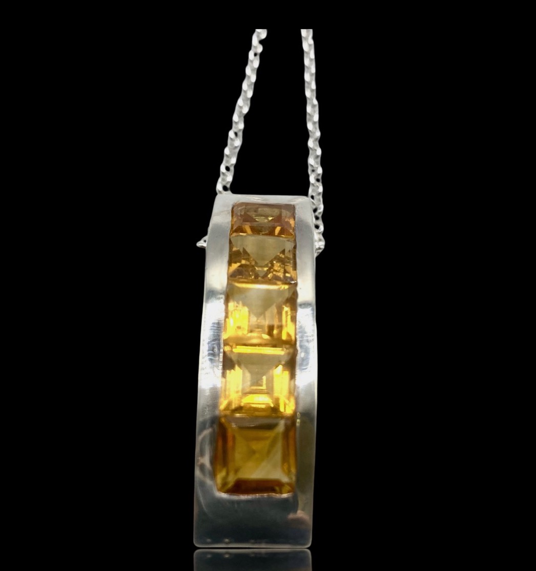 5 Yellow citrine stones set on sterling silver pendant