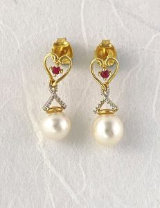gold pearl earrings with ruby and diamonds view 1