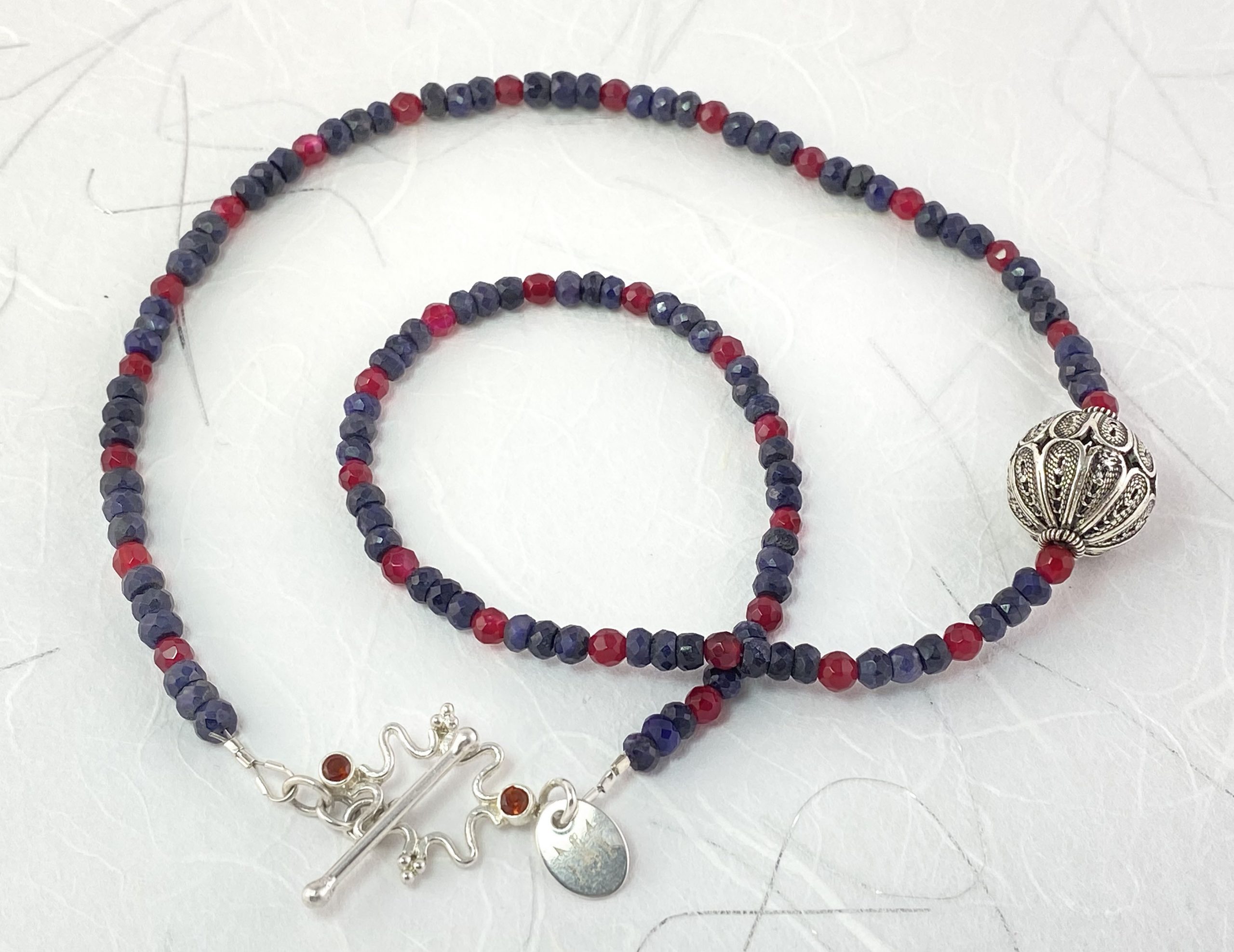 Blue sapphires and rubies necklace view 2