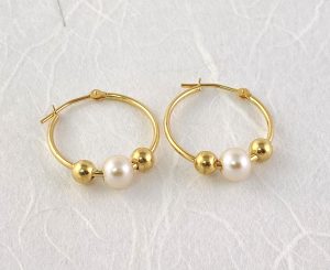 Gold hoops with gold balls and pearls view 2