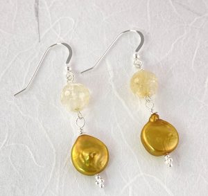 Goldish colored coin pearl earrings view 2
