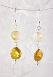 Goldish colored coin pearl earrings view 1