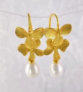 Pearl and Gold layered dogwood bloom shaped earrings view 2