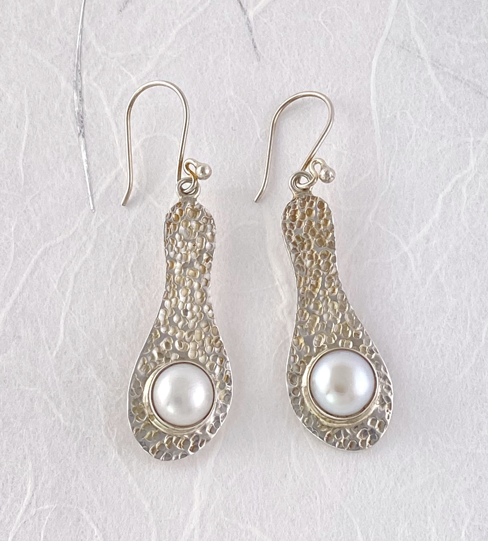 Mabe pearl and hammered sterling silver earrings
