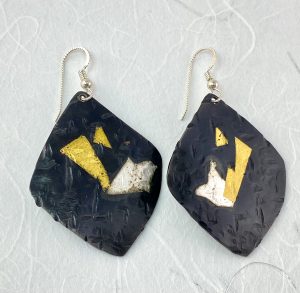 diamond shaped stainless steel with gold earrings view 2