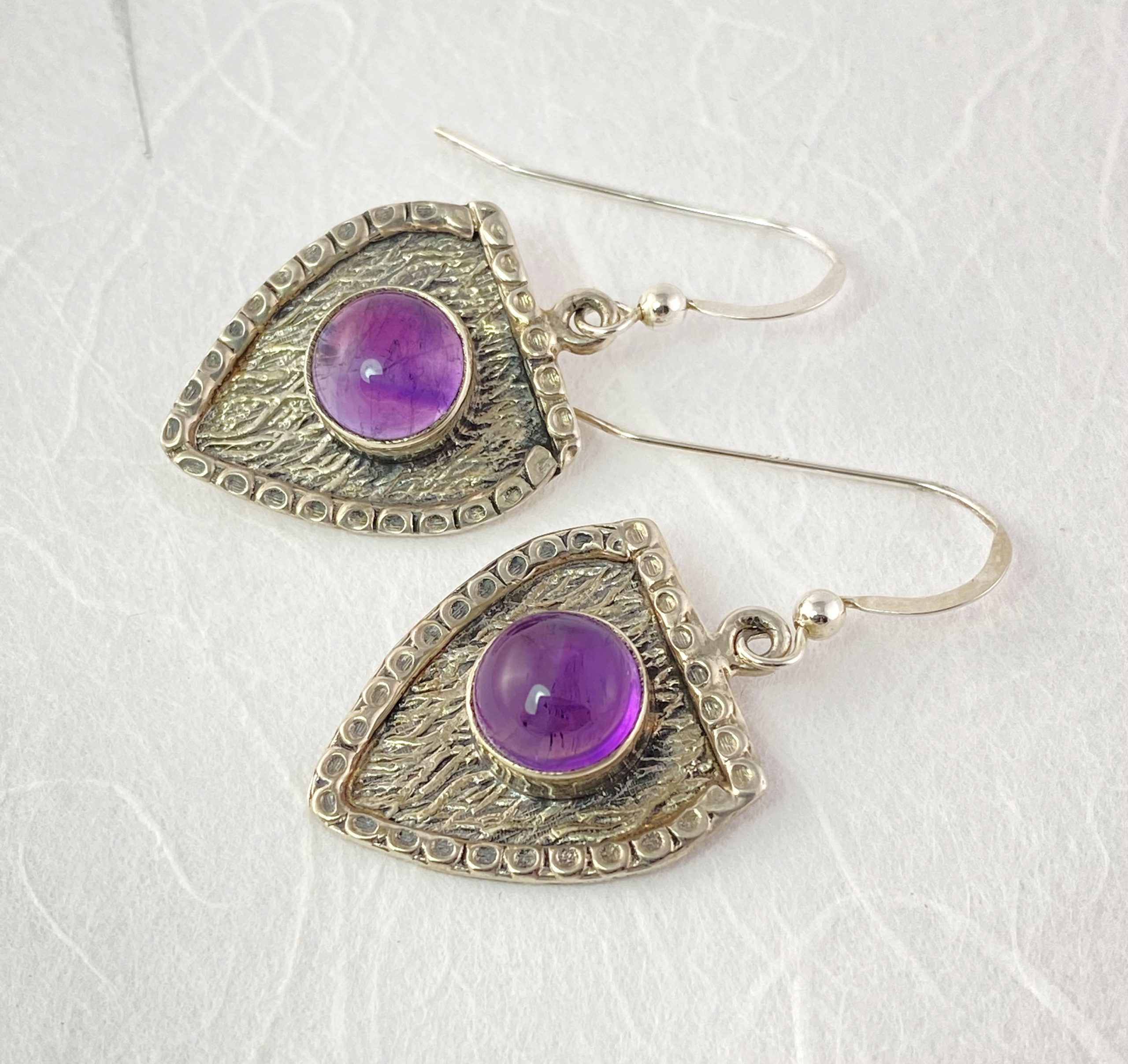 Silver crest and amethyst earrings view 3