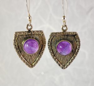 Silver crest and amethyst earrings view 1