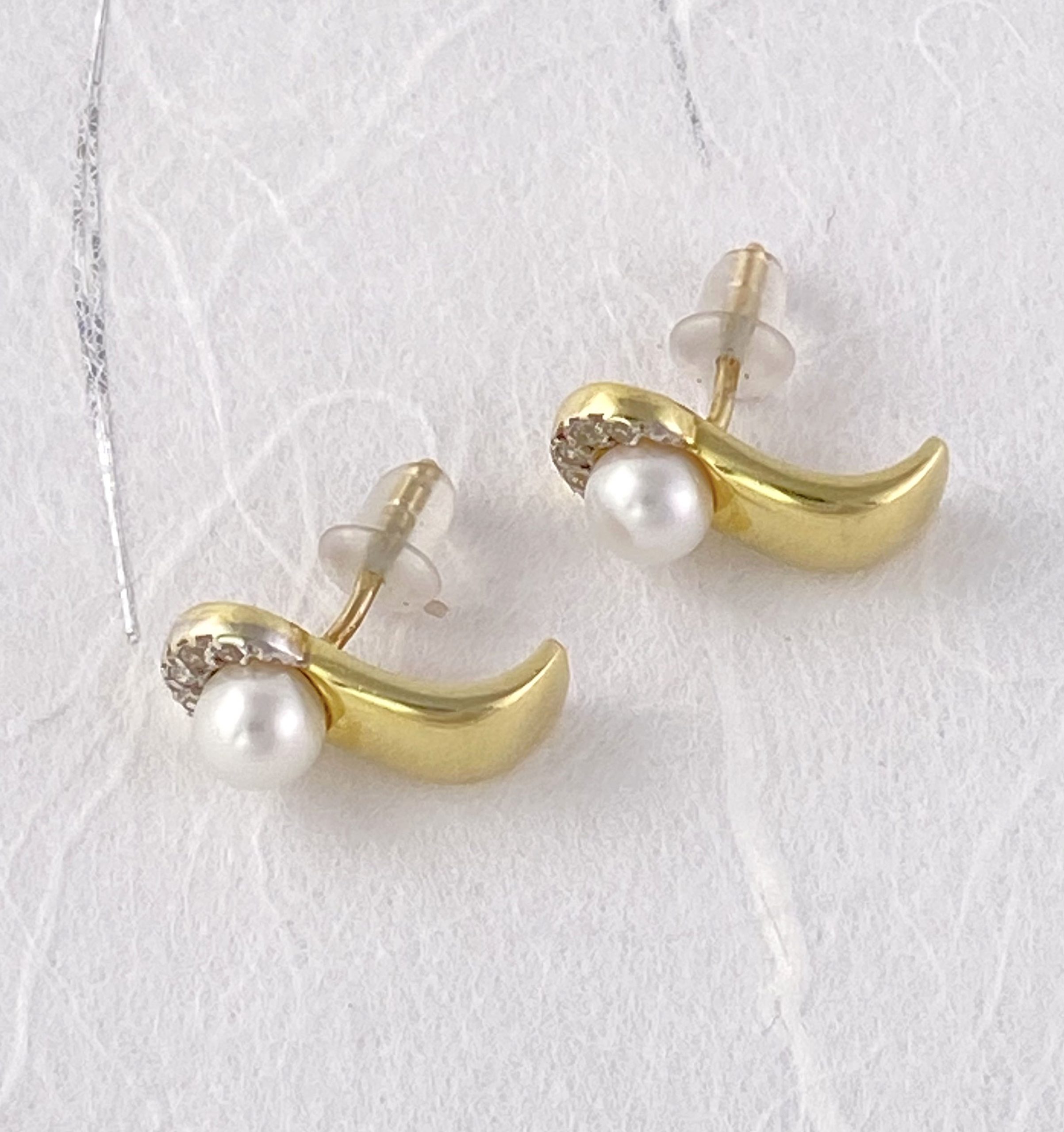 pearl studs with a diamond chip halo earrings view 3