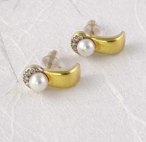 pearl studs with a diamond chip halo earrings view 2