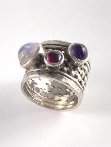 Silver ring with a combination of stones view 2