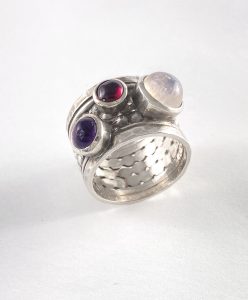 Silver ring with a combination of stones view 1